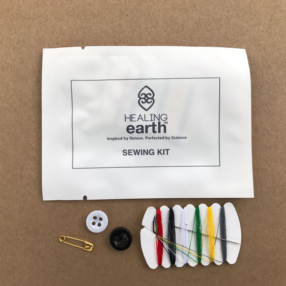 Sewing Kit with safety pin, needle and thread and buttons in an eco-friendly 100% biodegradable stone paper sachet. Sold by SR Amenities Hotel and Spa Supplies.