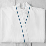 A luxuriously soft and comfortable bathrobe made from 400 thread count Egyptian cotton sateen with satin stitch finish in navy. Sold by SR Amenities Hotel and Spa Supplies at www.sramenities.co.za