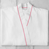 A luxuriously soft and comfortable bathrobe made from 400 thread count Egyptian cotton sateen with satin stitch finish in rose. Sold by SR Amenities Hotel and Spa Supplies at www.sramenities.co.za