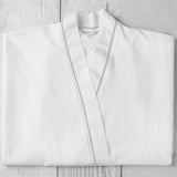 A luxuriously soft and comfortable bathrobe made from 400 thread count Egyptian cotton sateen with satin stitch finish in silver. Sold by SR Amenities Hotel and Spa Supplies at www.sramenities.co.za