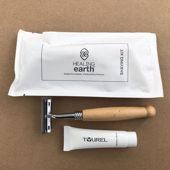 Healing Earth luxury eco-friendly bamboo razor with mini shaving cream for the discerning guest, presented in an easily recyclable 100% stone paper sachet.