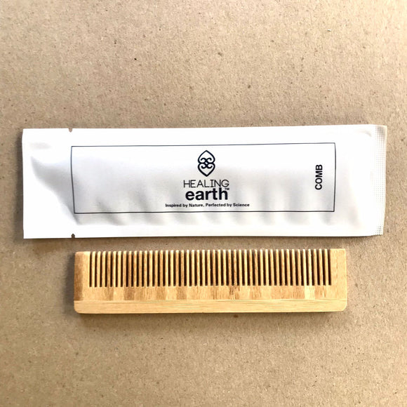 Healing Earth bamboo comb packaged in an easily recyclable 100% stone paper sachet.