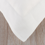 Duvet cover with oxford trim. Manufactured from white, plain weave, pure flax linen woven in Cape Town from French linen fibre. Sold by SR Amenities Hotel and Spa Supplies. 