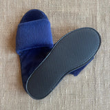 Navy fleece open toe slipper with EVA non-slip sole. 