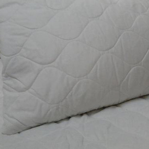 A polyester filler provides insulation and lofted comfort. The poly cotton blend is quilted for a soft feel. It is also waterproof, which makes this pillow protector one of a kind.   Available at www.sramenities.co.za