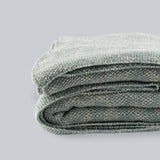 Knitted from pure cotton, these stonewash blankets are luxurious and soft. They are produced from hypoallergenic fibres. They are perfect for summer and spring to fight that extra chill. In the colour greenstone. Available at www.sramenities.co.za