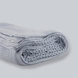 This beautiful blanket makes use of the age-old basket stitch and deep borders to create a timeless look. It has a cloudlike softness to it; due to the 100% pure cotton it is made of. This also makes the blanket breathable and hypoallergenic. With a variety of colours, this blanket fits into every decor and colour scheme. Available at www.sramenities.co.za