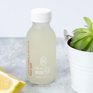 Healing Earth lemon verbena foam bath 100ml in white frosted glass bottle. Sold by SR Amenities Hotel and Spa Supplies.