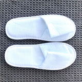 Single use disposable white waffle weave open toe slipper. Shop at www.sramenities.co.za
