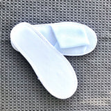 Single use disposable white terry towel open toe slipper. Shop at www.sramenities.co.za