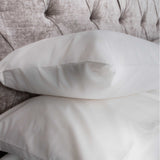 Pure combed cotton 600 thread count sateen construction pllow case in white. Sold by SR Amenities Hotel and Spa Supplies at www.sramenities.co.za