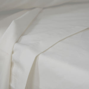 Top quality pure brushed cotton flat sheet in white. Sold by SR Amenities Hotel and Spa Supplies at www.sramenities.co.za