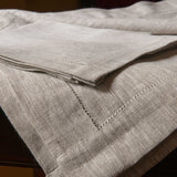 Luxury pure linen fabric tablecloth with hemstitch in natural linen colour. Sold by SR Amenities Hotel and Spa Supplies.