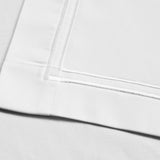 Luxury white sateen weave polycotton serviette finished with an elegant double row of satin stitching. Sold by SR Amenities Hotel & Spa Supplies.